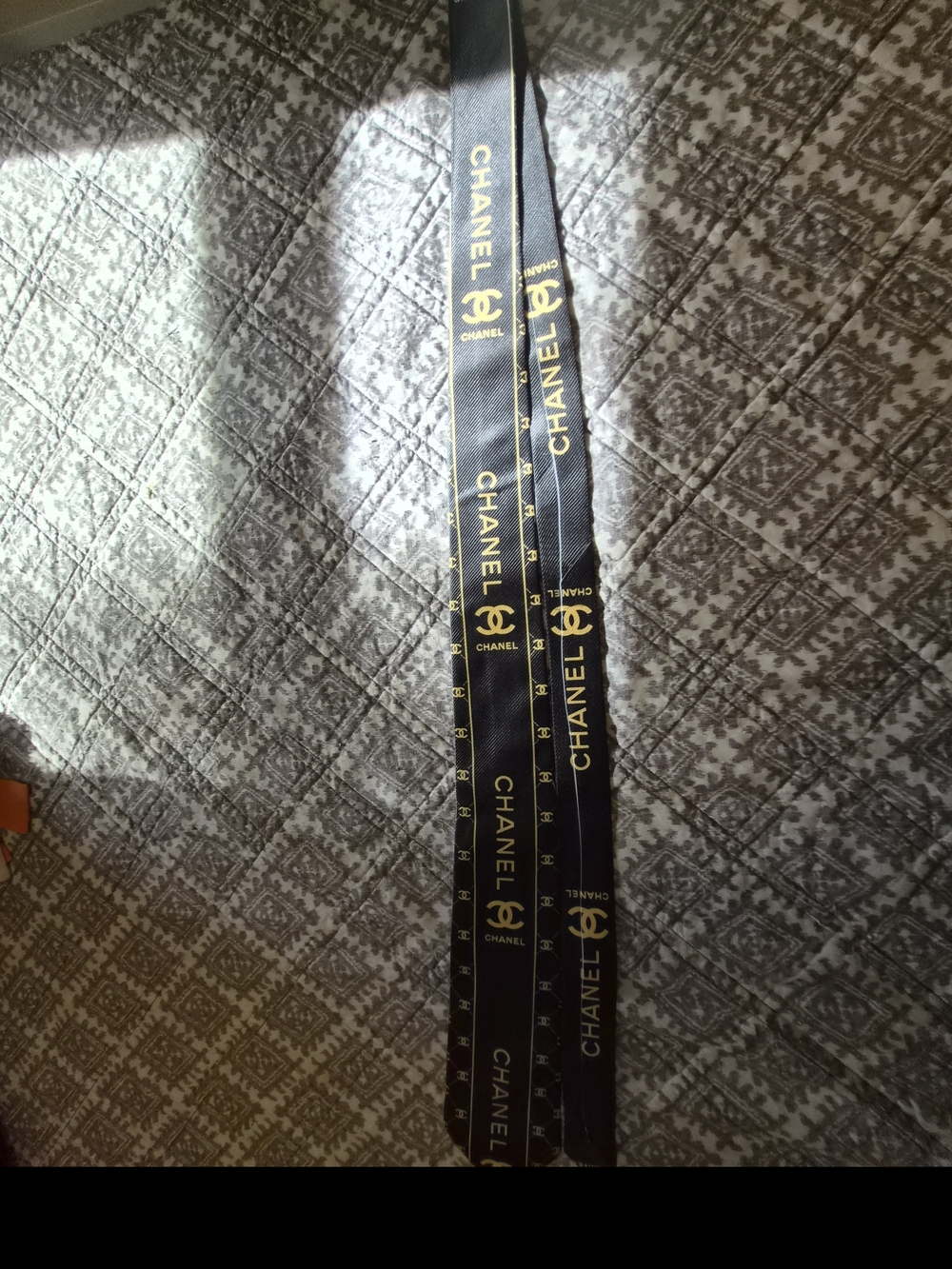CHANEL Black and Gold Logo Ribbon Tie
